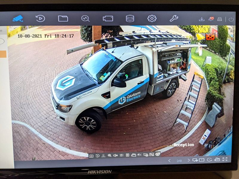 CCTV monitor showing the Gloform van on a driveway
